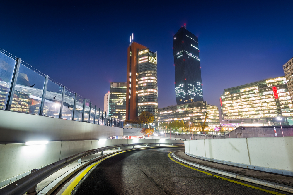 Modern buildings and ramp at night, in Donau City, in Vienna, Austria.